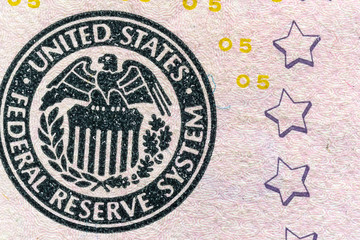 fragment of a banknote five American dollars