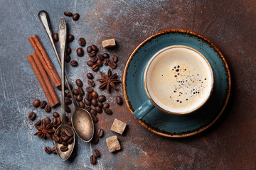 Coffee cup, beans and sugar