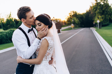 A summer walk of the newlyweds in nature.