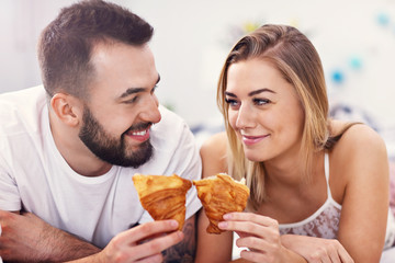 Adult attractive couple in bed