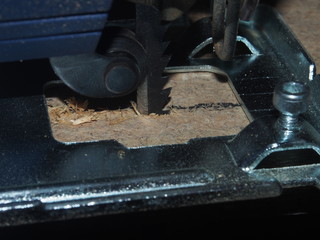 Chipboard sawn PR using an electric jigsaw.