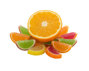 Fruit jell sugar candies and orange isolated on white background.