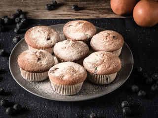 fluffy muffins after adding beautyfull white powdered sugar