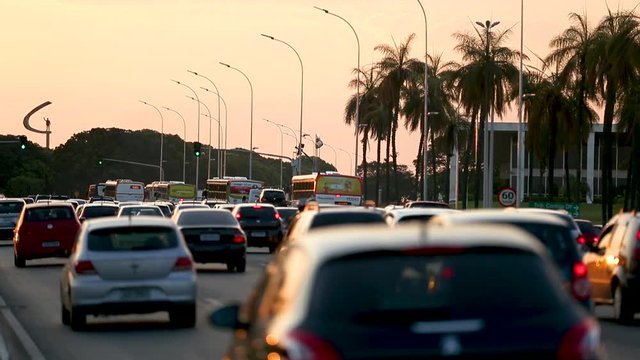 Long shot of traffic in Brasilia at sunset