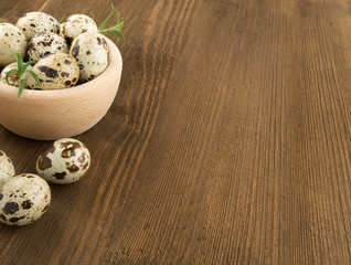 Quail Eggs on Wooden Background