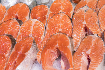 Salmon Fillet in Ice on the supermarket counter.