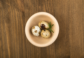 Quail Eggs on Wooden Background