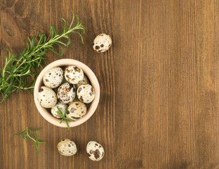 Quail Eggs on Wooden Background