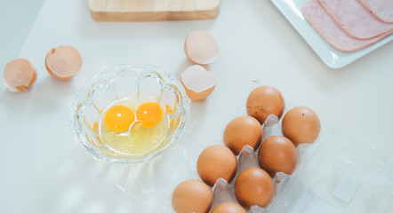 Eggs with ham are on the table.