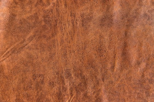 vintage brown cracked Italian goatskin leather for background use