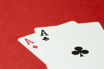 Two aces on a red background
