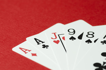 Six cards on red background close up