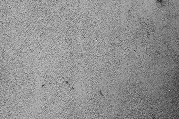 Wall fragment with scratches and cracks