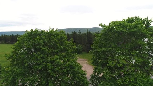 Aerial of two churches side by side in rural countryside