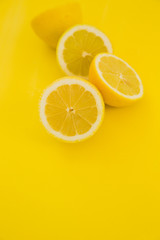 lemons on yellow background