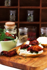 Sandwiches with dried tomatoes and cheese.