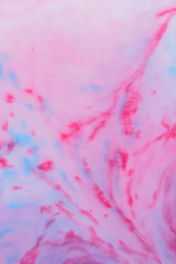 Abstract blue pink background, pink watercolor pattern, colored holographic water droplets, texture of pop art, minimalistic background for designer, holographic paint in liquid