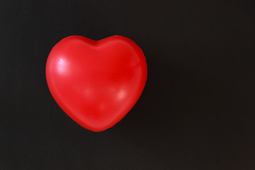  red heart on a black background