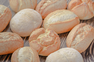homemade buns on a wooden background