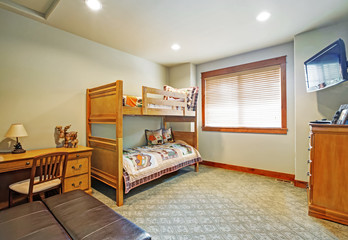 Kids' bunk room features bunk bed