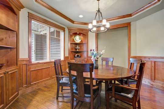 Sweet dining room interior with lots of woodwork details.