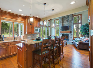 Gourmet kitchen with a bar style kitchen island