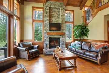 Stunning living room design with a stone wall fireplace