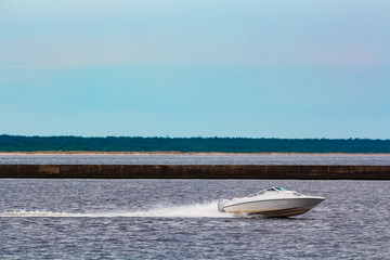 Fototapeta premium White speed boat in action