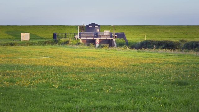 Dutch sea dike sluice gate polder drainage water outlet