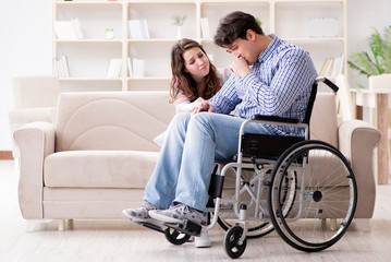 Desperate disabled person on wheelchair