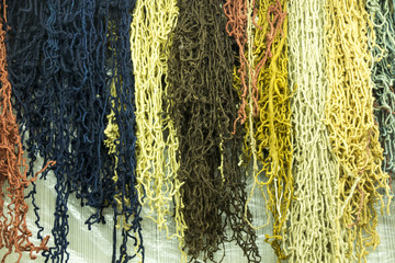 differently colored thick fibers for making carpets