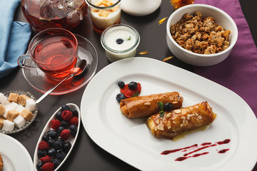 Caramel pankaces served on white platter, closeup