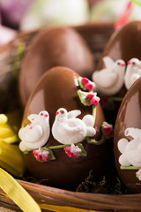 Decorated Chocolate easter egg on wooden table