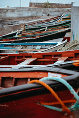 Fototapeta na wymiar Colored local fishing boats along the old fishing shore. Ponta do Sol Santo Antao Cape Verde