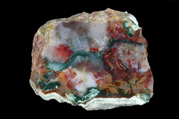 A cross-section of agate. Multicolored silica bands colored with metal oxides are visible. Origin:...