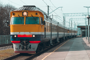 Obraz premium Yellow diesel train