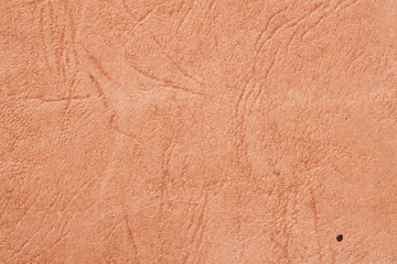 Texture of old brown paper with wrinkles, background for design with copy space text or image. Recyclable material, has small inclusions of cellulose