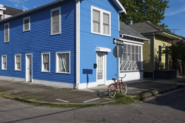 View of the facade of a colorful house in the Marigny neighborhood in the city of New Orleans,...