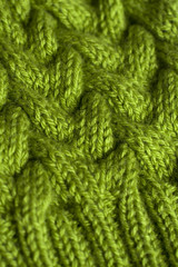 Green knitting fabric texture background or knitted pattern background