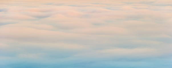 Fluffy creamy clouds soft morning light