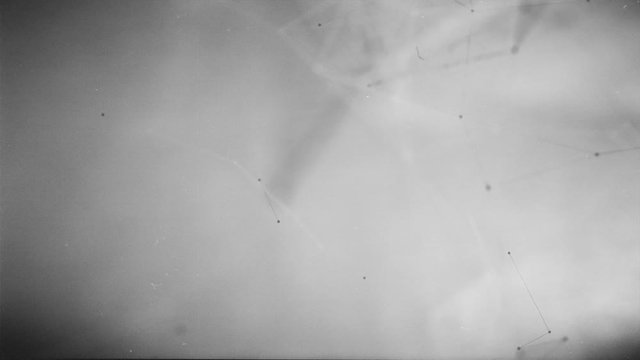 Artistick old blank screen vignette film effect with lines and dots motion. Selective focus used.