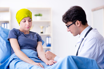 Cancer patient visiting doctor for medical consultation in clini