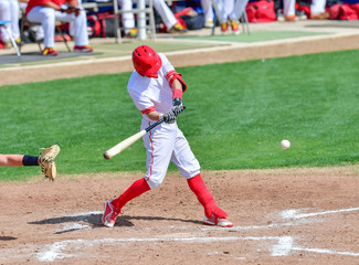Baseball player swinging the bat