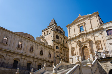 Fototapeta na wymiar Facade and stairway of the Church of San Francesco d'Assisi at the Immacolata di Noto, in Sicily