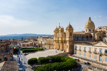 Fototapeta na wymiar View of the baroque cathedral, town hall and the main street of Noto