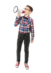 Cute little boy with megaphone on white background