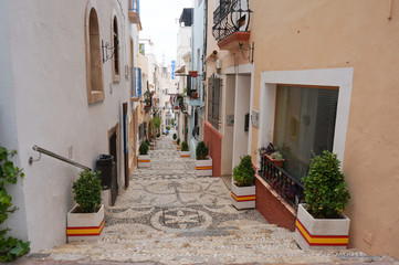 Nice street in old block of Cale town, Spain