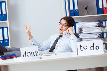 Businessman working on his to-do list
