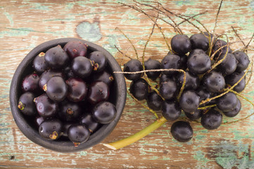 acai fruits on old wooden table
