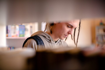 Caucasian student in library